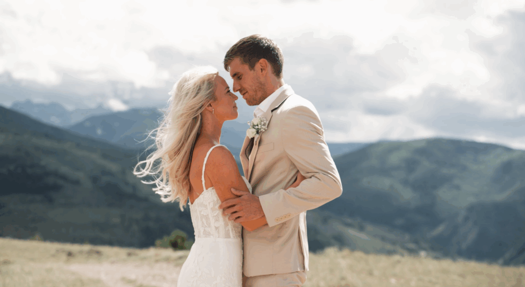bride and groom embracing during their mountain wedding in Colorado
