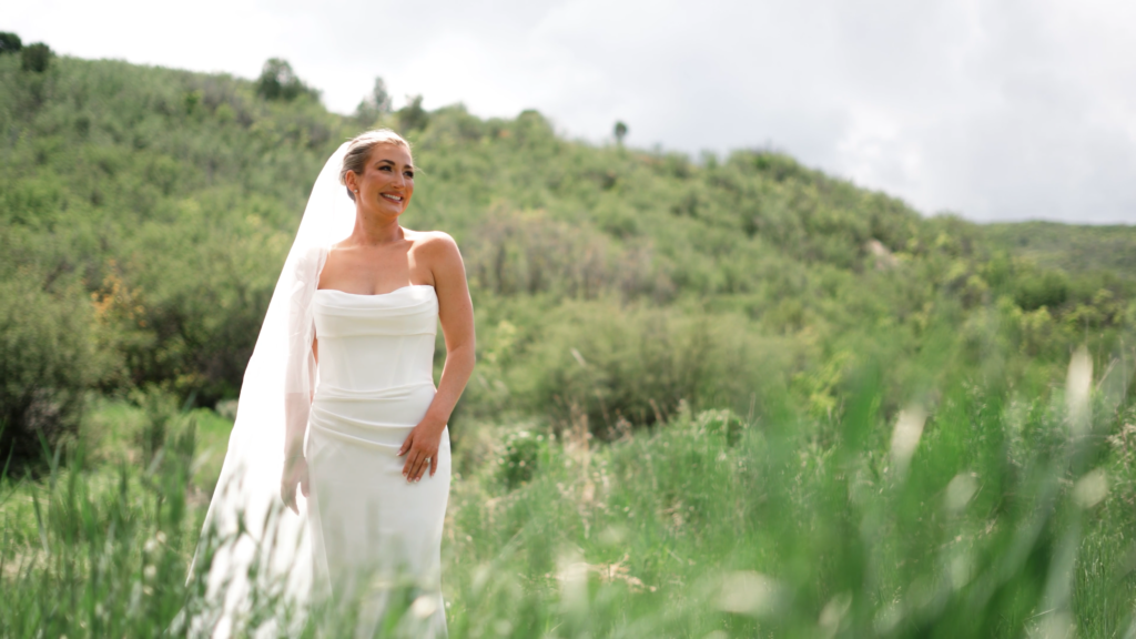 bride posing for eagle colorado wedding videographer